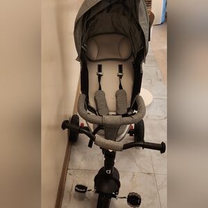 Gray Baby Stroller with Black Accents. 2 In 1.  Stroller/bicycle